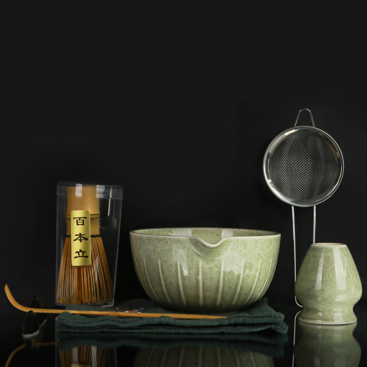 Matcha Bowl and Tea Whisk Set, 7-Piece Collection: 19-ounce ceramic bowl, whisk stand, bamboo scoop with scoop holder, tea strainer, and tea towel. Complete matcha ceremony set.