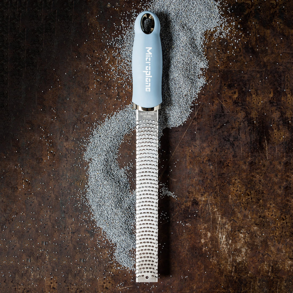 Microplane Zester Grater in Sky Blue for Citrus Fruits, Hard Cheese, Ginger, Chocolate and Nutmeg with Fine Stainless Steel Blade - Made in USA